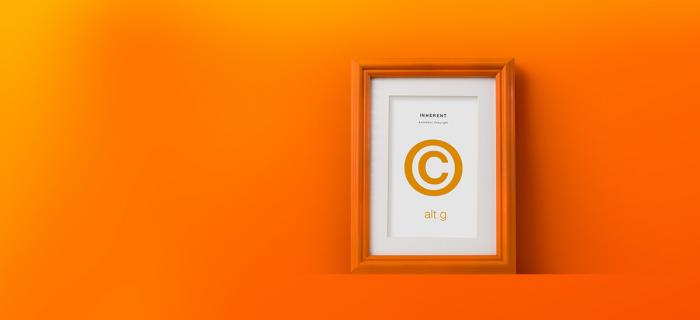 Copyright symbol in an orange picture frame.